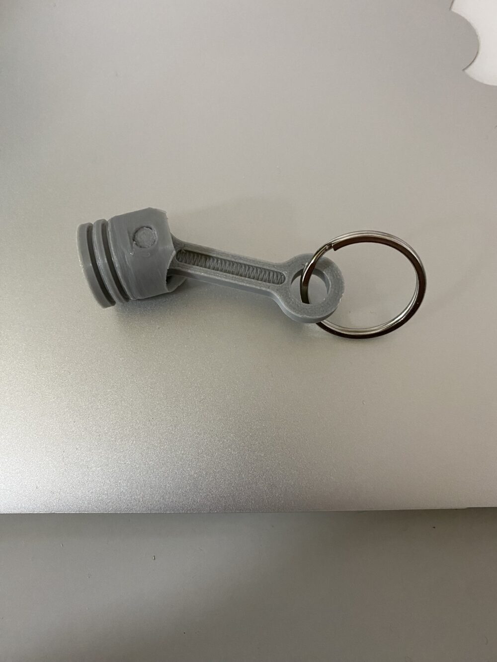 Porta-Chaves Pistão