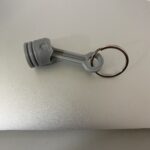 Porta-Chaves Pistão